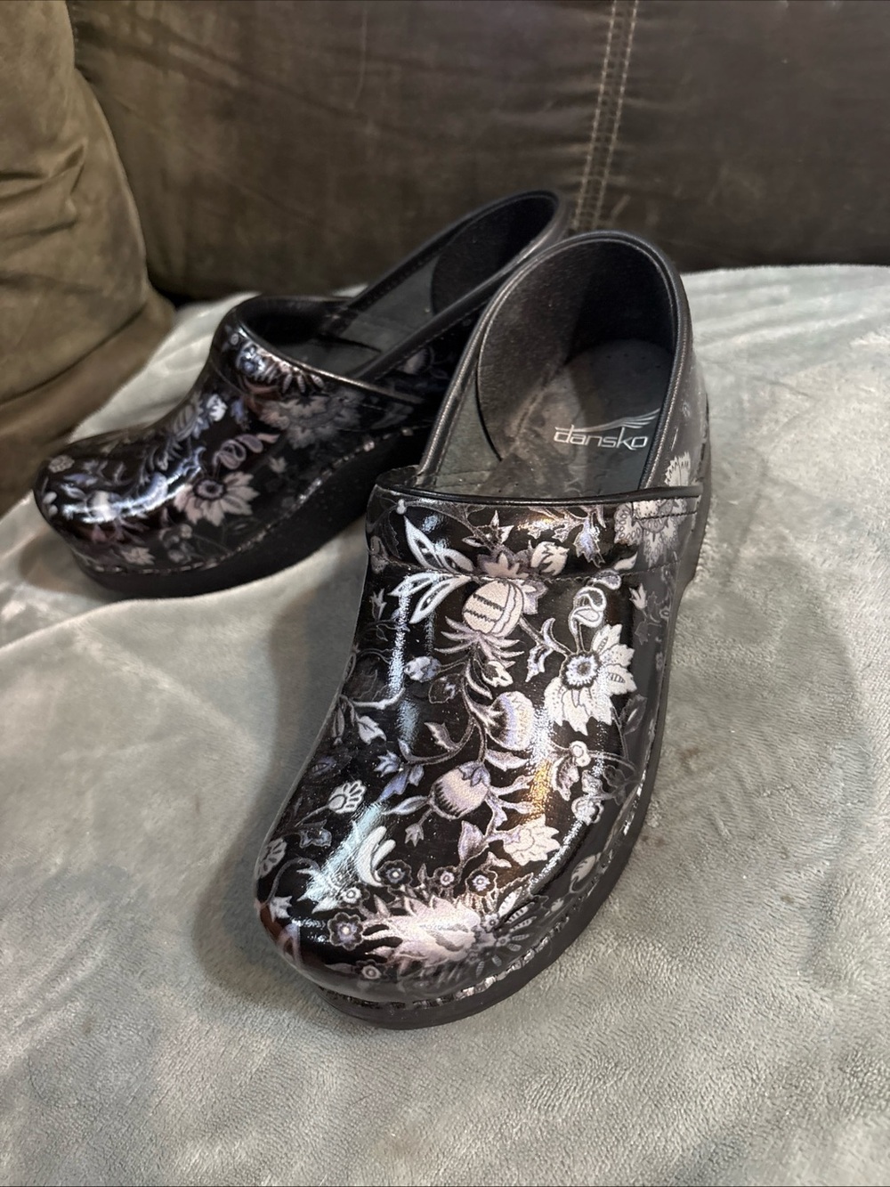 Dansko Black Patent Floral Clogs with Silver Accents